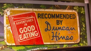 A roadside sign advertising Duncan Hines' Adventures in Good Eating is on display at the Kentucky Museum at Western Kentucky University.